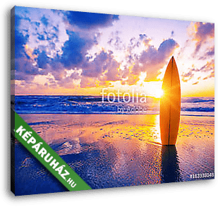 Surfboard on the beach at sunset - vászonkép 3D látványterv