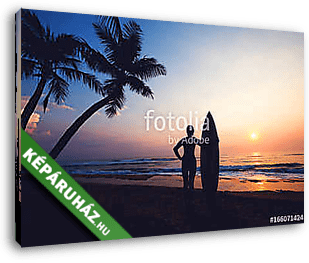 Silhouette women surfer on tropical beach at sunset. landscape of summer beach and palm tree at sunset. vintage color tone - vászonkép 3D látványterv