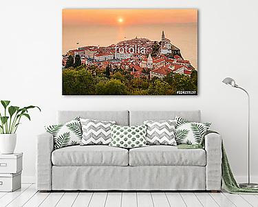 Romantic colorful sunset over picturesque old town Piran with sun on the background, Slovenia. Scenic panoramic view. (vászonkép) - vászonkép, falikép otthonra és irodába