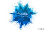 Freeze motion of blue powder explosions isolated on white background vászonkép, poszter vagy falikép