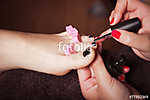 applying nail polish vászonkép, poszter vagy falikép