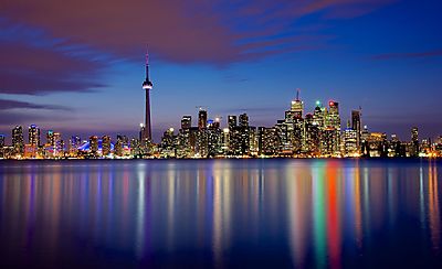 Toronto látképe esti világításban (vászonkép óra) - vászonkép, falikép otthonra és irodába