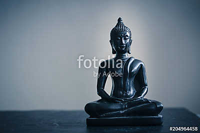 black statue of Buddha (keretezett kép) - vászonkép, falikép otthonra és irodába