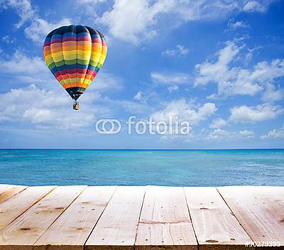 Kilátással a tengerre  hőlégballonnal (vászonkép óra) - vászonkép, falikép otthonra és irodába