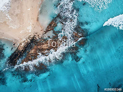 Aerial view of waves, rocks and transparent sea. Summer seascape (keretezett kép) - vászonkép, falikép otthonra és irodába