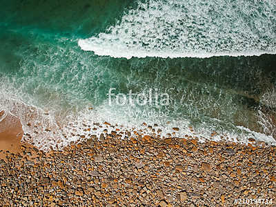 Aerial view of sandy beach with waves perfect spot for surfing. Drone photo  (keretezett kép) - vászonkép, falikép otthonra és irodába