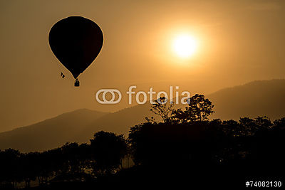 Hőlégballon sziluett a naplementében (többrészes kép) - vászonkép, falikép otthonra és irodába