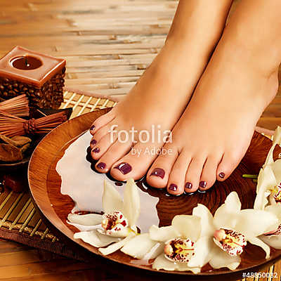 female feet at spa salon on pedicure procedure (bögre) - vászonkép, falikép otthonra és irodába