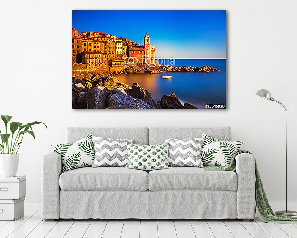 Tellaro sziklák, templom és falu naplementekor. Cinque terre, Li - vászonkép, falikép vásárlás Tellaro sziklák, templom és falu naplementekor. Cinque terre, Li (vászonkép) - vászonkép, falikép otthonra és irodába
