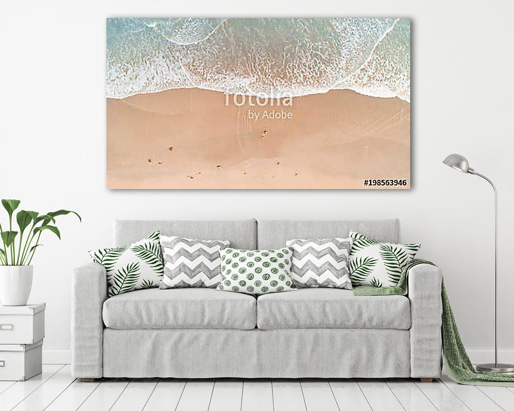 Aerial View of People Walking Along Beach at Sunset - vászonkép, falikép vásárlás Aerial View of People Walking Along Beach at Sunset (vászonkép) - vászonkép, falikép otthonra és irodába