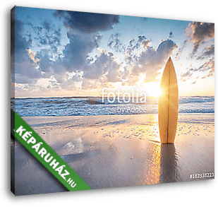 Surfboard on the beach at sunset - vászonkép 3D látványterv