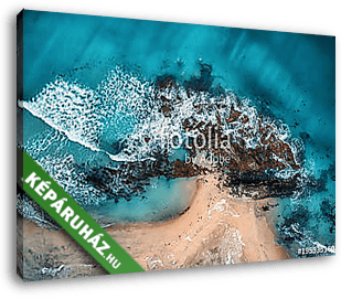 Aerial view of waves, rocks and transparent sea. Summer seascape - vászonkép 3D látványterv