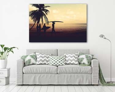 Art photo styles of silhouette surfer on beach at sunset - vintage color tone (vászonkép) - vászonkép, falikép otthonra és irodába
