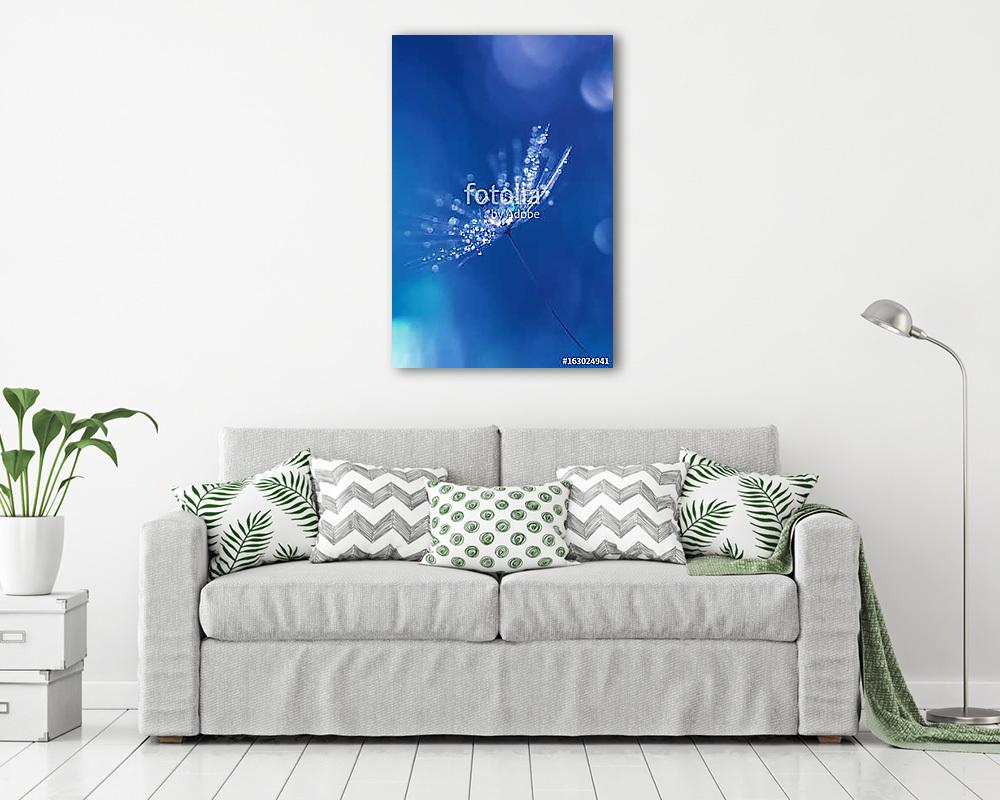 Dandelion with drops of water and a beautiful bokeh on a blue ba (fotótapéta) - vászonkép, falikép otthonra és irodába
