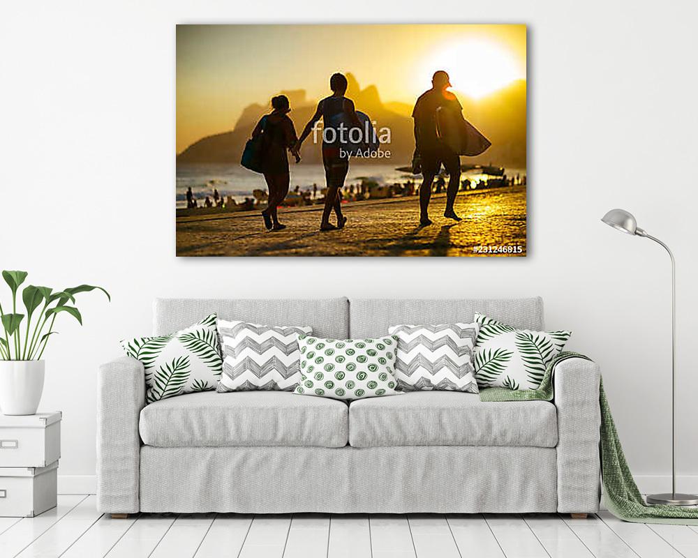 Scenic sunset silhouettes walking with surfboards along the boardwalk in front of Ipanema Beach in Rio de Janeiro, Brazil (fotótapéta) - vászonkép, falikép otthonra és irodába