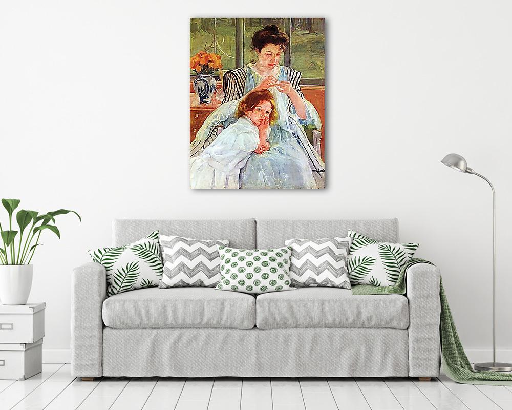 Fiatal anya varrás közben - vászonkép, falikép vásárlás Fiatal anya varrás közben (poszter) - vászonkép, falikép otthonra és irodába