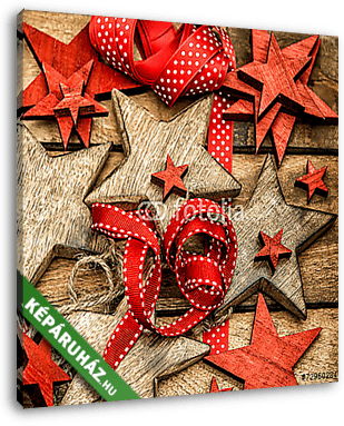 karácsonyi díszek fából készült csillagok és piros szalagok - vászonkép 3D látványterv