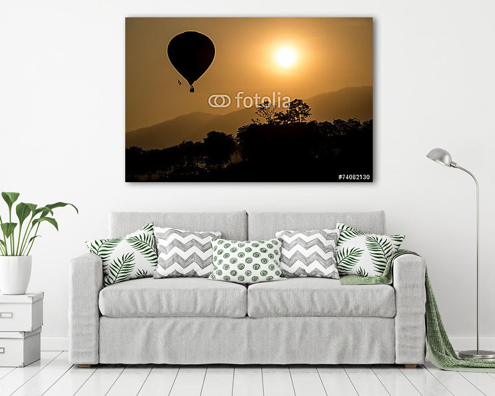 Hőlégballon sziluett a naplementében (többrészes kép)