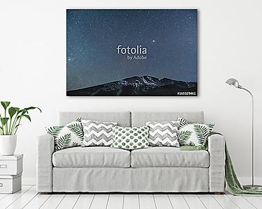 Star filled sky over snowy mountains at night (vászonkép) - vászonkép, falikép otthonra és irodába