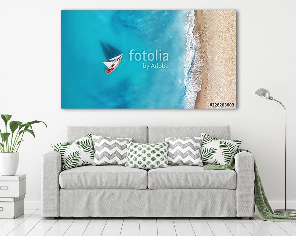 Yacht on the water surface from top view. Turquoise water background from top view. Summer seascape from air. Travel concept and - vászonkép, falikép vásárlás Yacht on the water surface from top view. Turquoise water background from top view. Summer seascape from air. Travel concept and (vászonkép) - vászonkép, falikép otthonra és irodába