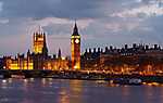 A londoni Parlament és a Big Ben esti diszkivilágításban vászonkép, poszter vagy falikép