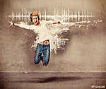 boy with headphones jumping - guy 04 (id: 13751) falikép keretezve