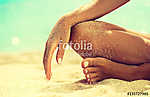 Woman In Relaxation On Tropical Beach with sand , body parts . T vászonkép, poszter vagy falikép