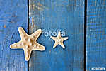 tengeri csillag a kék fán vászonkép, poszter vagy falikép