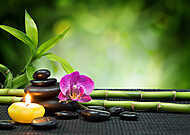 lila orchidea, gyertya, kövekkel, bambusz fekete matracon vászonkép, poszter vagy falikép