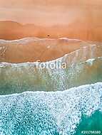 Aerial view of a man walking along a beach in Asturias vászonkép, poszter vagy falikép