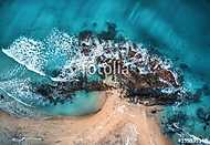 Aerial view of waves, rocks and transparent sea. Summer seascape vászonkép, poszter vagy falikép