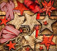 karácsonyi díszek fából készült csillagok és piros szalagok vászonkép, poszter vagy falikép