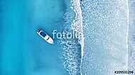 Wave and boat on the beach as a background. Beautiful natural background at the summer time from air vászonkép, poszter vagy falikép