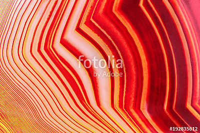 Amazing Banded Red Agate Crystal cross section as a background. Natural light translucent agate crystal surface,  Colorful abstr (poszter) - vászonkép, falikép otthonra és irodába