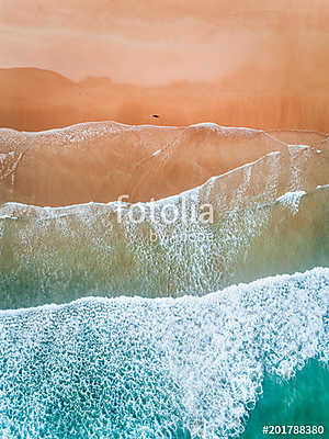 Aerial view of a man walking along a beach in Asturias (poszter) - vászonkép, falikép otthonra és irodába