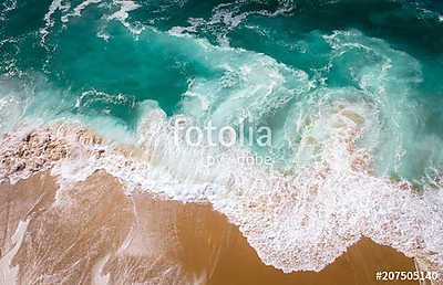 Sand beach aerial, top view of a beautiful sandy beach aerial shot with the blue waves rolling into the shore (keretezett kép) - vászonkép, falikép otthonra és irodába