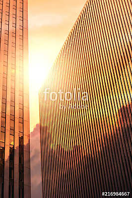 Skyscrapers from ground view with fogy sky visible. (többrészes kép) - vászonkép, falikép otthonra és irodába