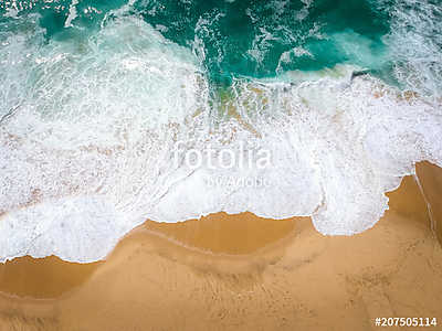 Sand beach aerial, top view of a beautiful sandy beach aerial shot with the blue waves rolling into the shore (keretezett kép) - vászonkép, falikép otthonra és irodába