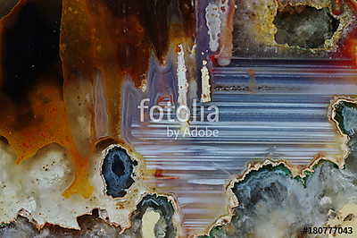 Macrophotography of cut agate. Stalactite-horizontal agate. Multicolored silica bands colored with metal oxides are visible. Ori (poszter) - vászonkép, falikép otthonra és irodába