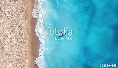 Boat on the water surface from top view. Turquoise water background from top view. Summer seascape from air. Travel concept and  (vászonkép óra) - vászonkép, falikép otthonra és irodába