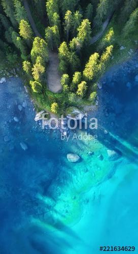 Aerial view on the lake and forest. Natural landscape from drone. Aerial landscape from air in the Dolomite alps, Italy., Premium Kollekció