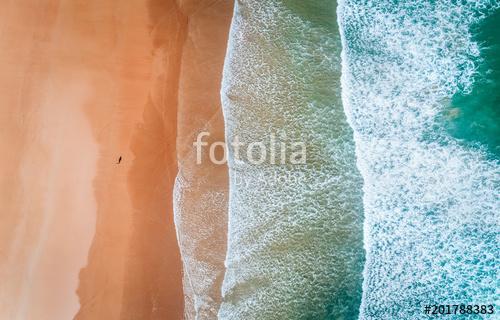 Aerial view of a man walking along a beach in Asturias, Premium Kollekció