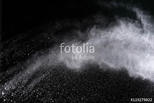 Freeze motion of white powder explosions isolated on black background, Premium Kollekció