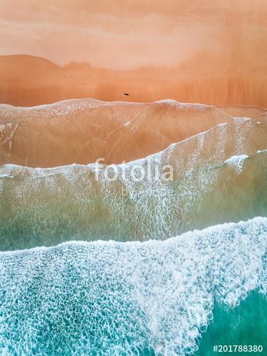 Aerial view of a man walking along a beach in Asturias, Premium Kollekció