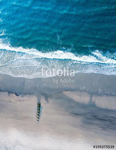 Wooden dock on a empty beach aerial, Premium Kollekció