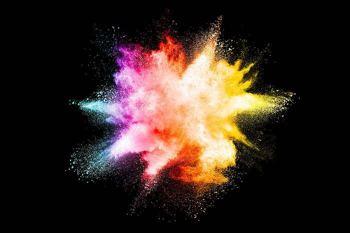 Explosion of colored powder isolated on black background., Premium Kollekció