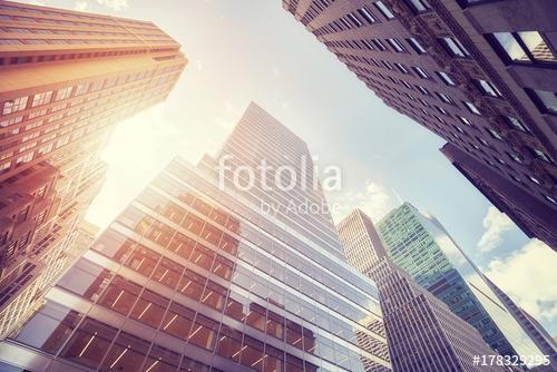 Vintage toned Manhattan skyscrapers at sunset, New York City, US, Premium Kollekció