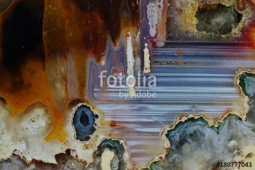 Macrophotography of cut agate. Stalactite-horizontal agate. Multicolored silica bands colored with metal oxides are visible. Ori, Premium Kollekció