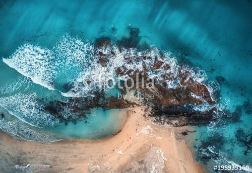 Aerial view of waves, rocks and transparent sea. Summer seascape, Premium Kollekció