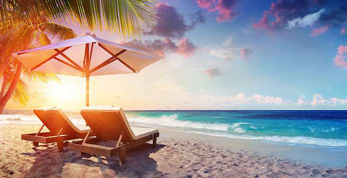 Two Deckchairs Under Parasol In Tropical Beach At Sunset
, Premium Kollekció